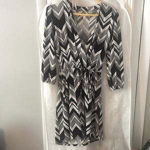 Charming Charlie’s Womens T length wrap style dress.